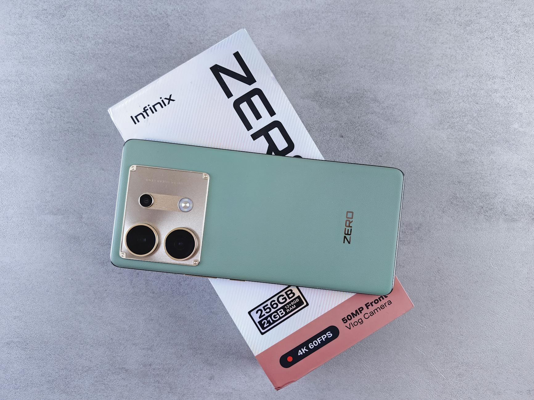 Infinix Zero Flip 5G Specs Sheet With Renders Revealed Ahead of Launch के स्पेक्स और रेंडर्स लीक हुए, लॉन्च से पहले a green phone with a camera on it